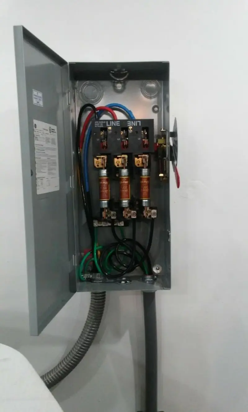 Three-phase disconnect switch installed for Smoke Detector Installation in Essex